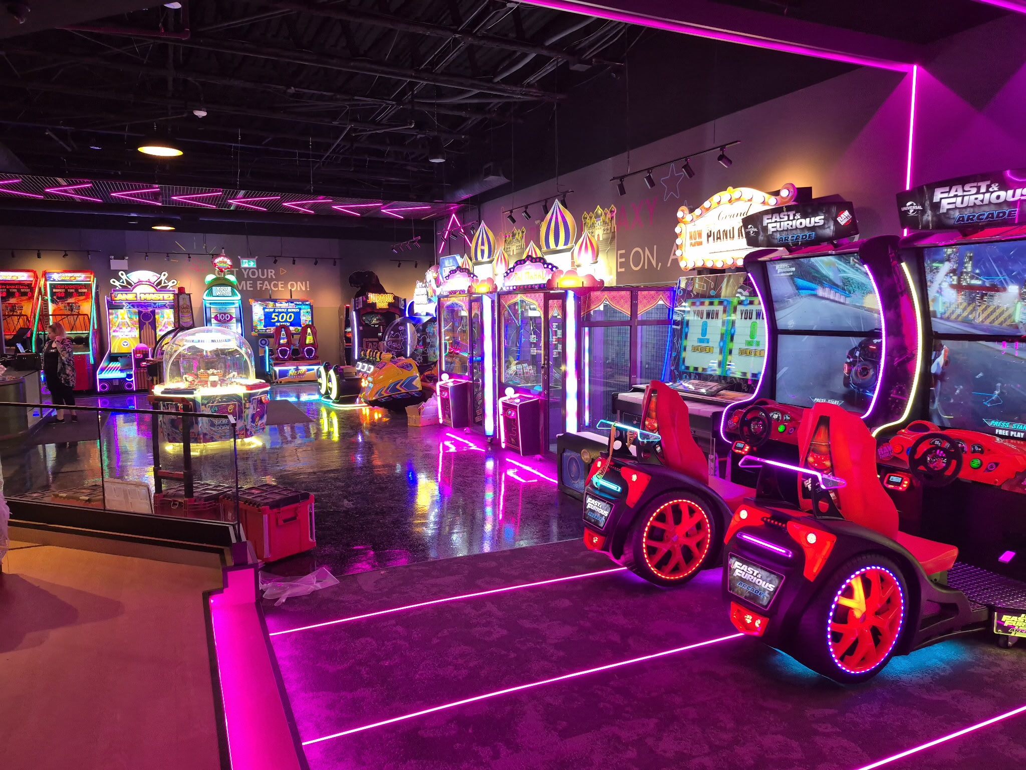 Teen playing retro arcade games at The Play Scape Toronto